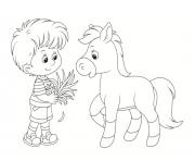 Coloriage garcon donne a manger au poney