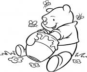 Coloriage winnie ne cesse de manger le miel de la ruche