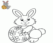 Coloriage lapine avec un oeuf paques decore de fleurs